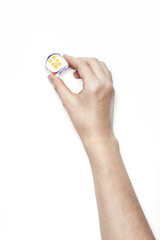 Fototapeta na wymiar woman hand hold a dice isolated white.