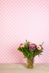 Colorful  bouquet flowers in blue vase