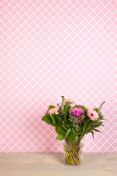 Colorful  bouquet flowers in blue vase