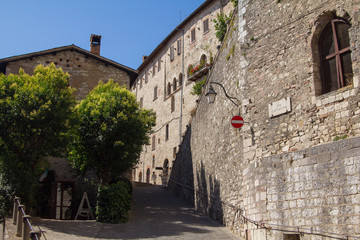 Street of Gubbio with medieval buildings, Italy