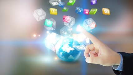 Hand touch screen social media icons.