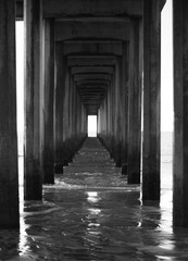 Under pier endless perspective black and white