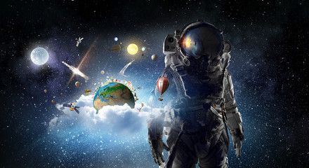 Naklejka premium Astronaut in outer space. Mixed media