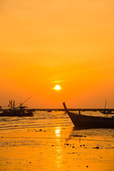 sunset on the beach of andaman sea
