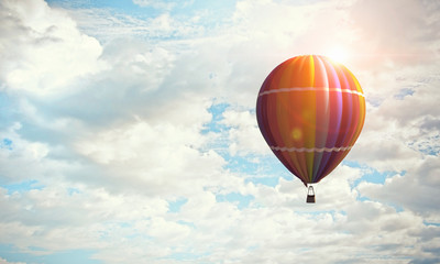 Aerostat flying above clouds