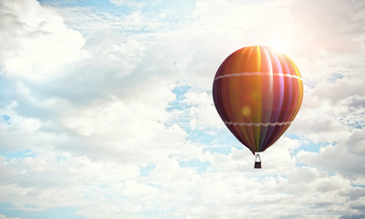 Naklejka premium Aerostat flying above clouds