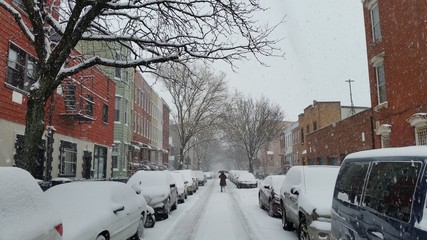 Walking down the street in winter