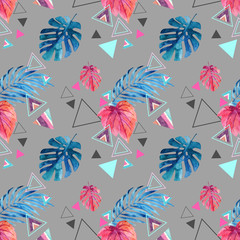 Abstract watercolor triangle and exotic leaves seamless pattern.