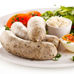 White sausages with boiled eggs and horseradish
