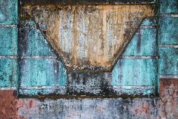 Weathered, dirty and aged colorful concrete wall texture background with vignetting.