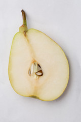 slide of cut pear on white background