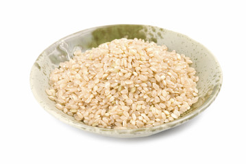 Isolated brown rice in bowl