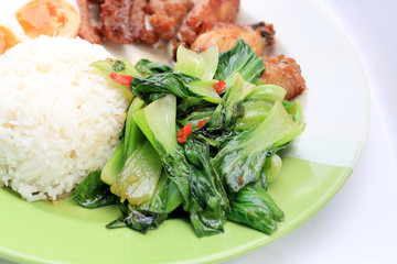 stir fried vegetables, Hard-boiled egg, Fried pork and Fried chicken wings with thai jasmine rice...