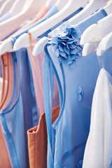 Details of bright beautiful pastel tones dress collection in show room