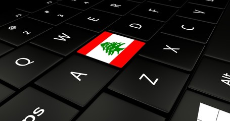 Close up of Lebanon flag button on laptop keyboard.