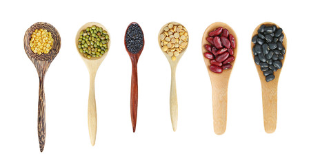 Variety of Whole grain beans in wood spoon isolated on white background.