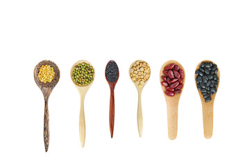Variety of Whole grain beans in wood spoon isolated on white background.