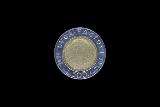 Italian Lira coin bearing the portrait of Luca Pacioli (1447-1517), released by Italy in 1994 on the 500th anniversary of his treatise Summa de arithmetica (i.e. On arithmetics)