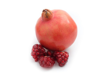 Ripe pomegranate fruit on white background