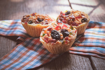 fruit tart close up with berries on wooden