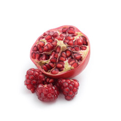 Ripe pomegranate fruit on white background