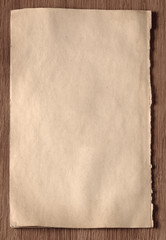 old paper on wood deck with copy space