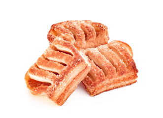 Puff pastry with jam with powdered sugar closeup. Top view, flat