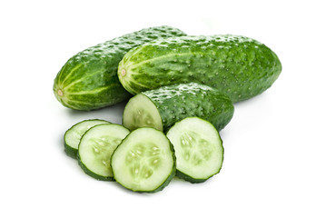 Green Cucumber. The cutting of the cucumber with pieces. Isolated on white background.