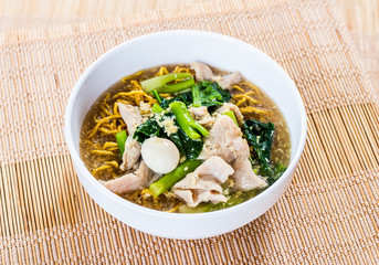Fried noodle with pork in bowl