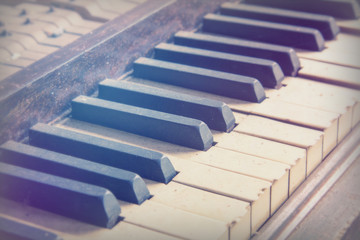 Keys from an old broken damaged piano