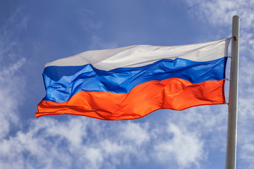 Russian flag on sky and cloud background