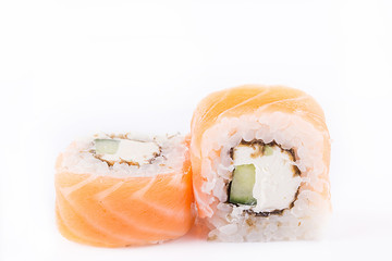 japanese Cuisine, Sushi Set: salmon roll with cucumber and cheese on a white background.