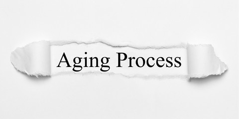 Aging Process on white torn paper