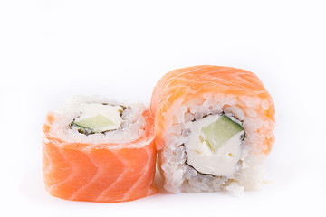 japanese Cuisine, Sushi Set: salmon roll with cheese and cucumber on a white background.