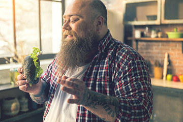 Man enjoying tasty burger