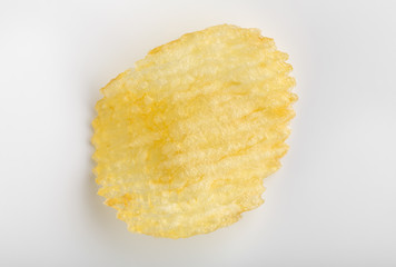 Crispy potato chips. Fast Food. Potatoes. Fatty unhealthy foods. corrugated chips