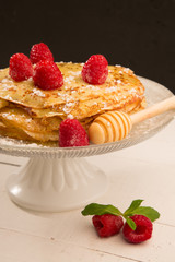 Pancake with raspberry and honey