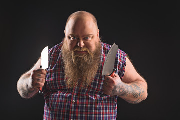 Man with knives expressing his aggression