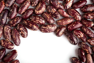 Dark Spotted kidney bean isolated on white background. Dark kidney bean texture background. A large bean with a subtle sweet flavor and soft texture. Beans. Proper nutrition. Vitamins. Healthy food.