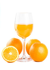 Orange juice. Isolated drink. A glass of orange juice and pieces of orange fruit isolated on white background. Citrus. Diet. Vitamins. Healthy food.