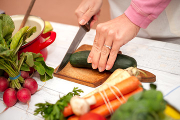 Woman cutting vegetables