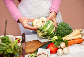 Woman preparing cauliflower