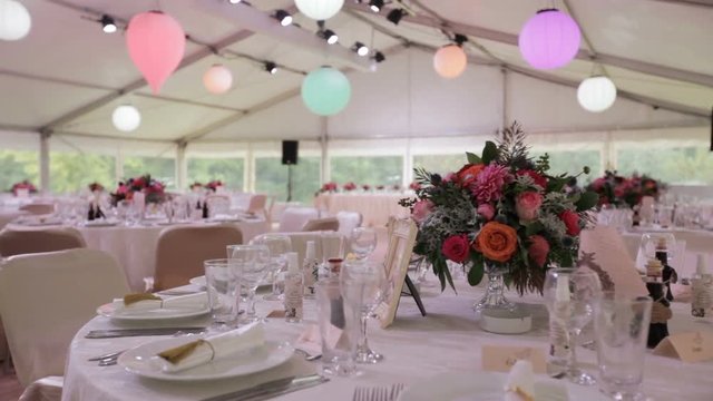 Reception decoration for elegant wedding party in tent