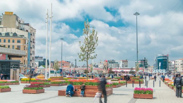 Taksim square timelapse, Istanbul, Turkey. Cars and people in the busy Taksim Square