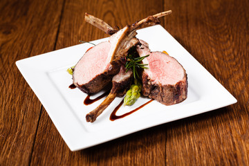 Baked lamb loin, served with asparagus. © gkrphoto