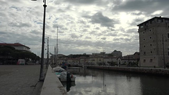 ancient harbor channel in Emilia Romagna, Italy in acloudy day in spring