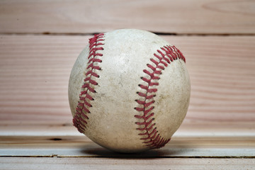 Baseball ball on wooden background