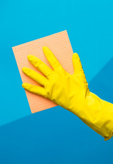 Person wipes window with rag