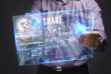 Business, Technology, Internet and network concept. Young businessman working on a virtual screen of the future and sees the inscription: Share