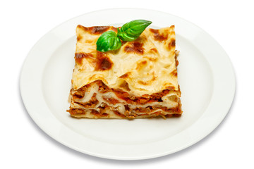 Portion of tasty lasagna isolated on white